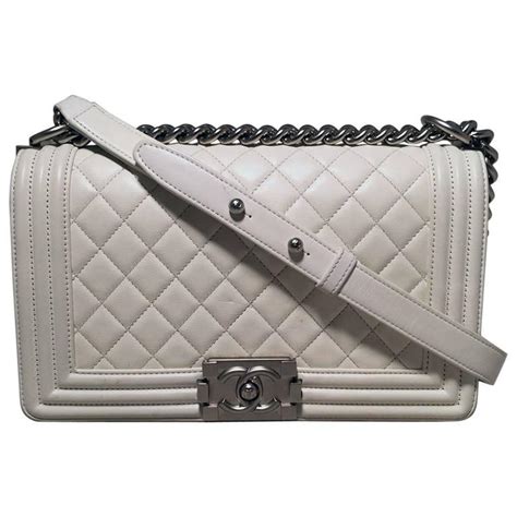 white Chanel bag boy